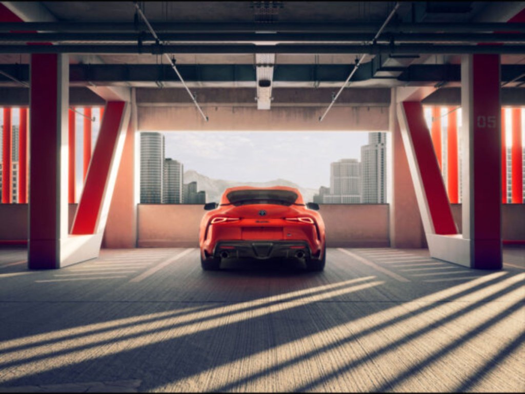A 2024 Toyota GR Supra in a parking garage.