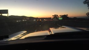 I drove my classic car, a 1967 Chevrolet Camaro, at sunset on I5 in Southern California.
