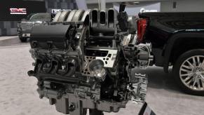 A GMC 5.3L V8 engine cutaway at the 2019 New England International Auto Show (NEIAS) in Boston, Massachusetts