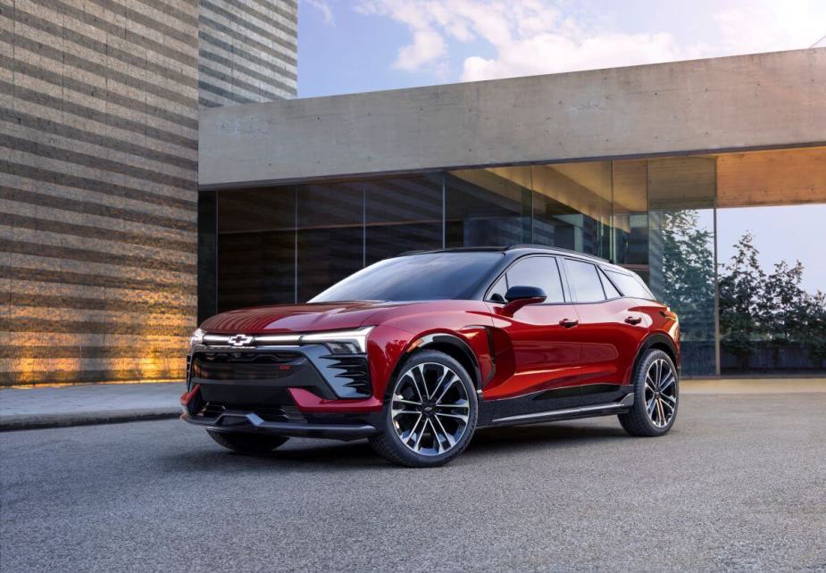 A 2024 Chevy Blazer EV RS all-electric compact SUV model in the Radiant Red Tintcoat paint color option
