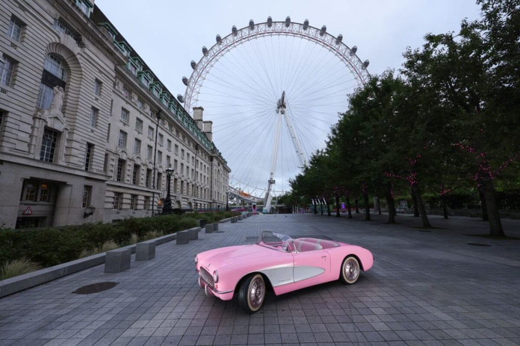Barbie's Chevrolet Corvette from the movie parks on a London street.