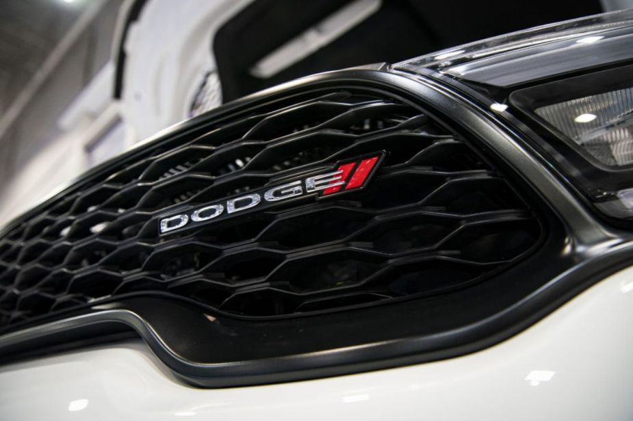A Dodge logo seen on the front grille of a Durango.