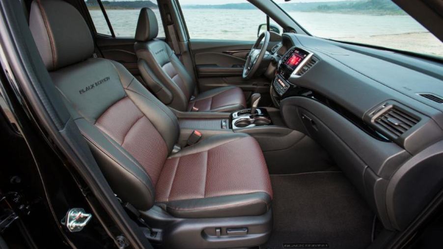 Black and brown leather interior of a 2018 black edition Honda Ridgeline truck