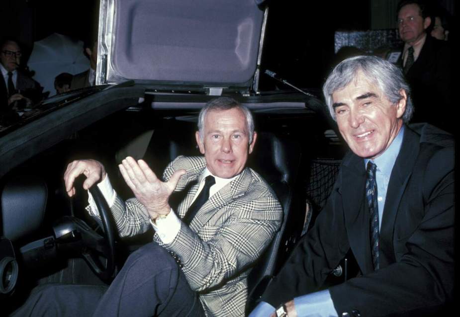 Johnny Carson and John DeLorean at the unveiling of the DeLorean Motor Car on Feb. 8, 1981, in Los Angeles