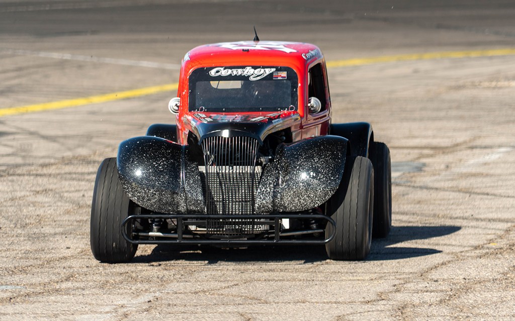 A U.S. Legend car pulling into the pits at Las Vegas Motor Speedway