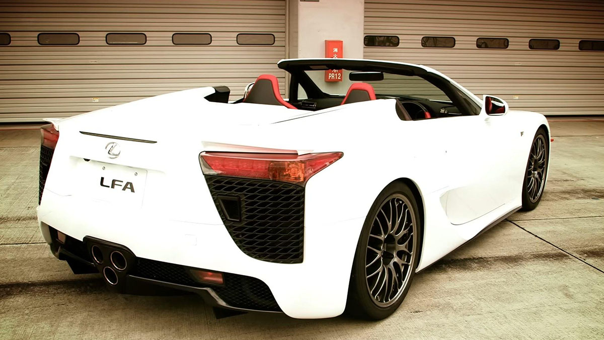 White Lexus LFA Roadster extremely rare convertible supercar driven by Jay Leno rear view top down