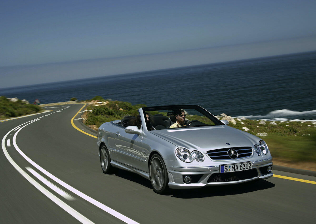 Mercedes-Benz CLK driving down a road