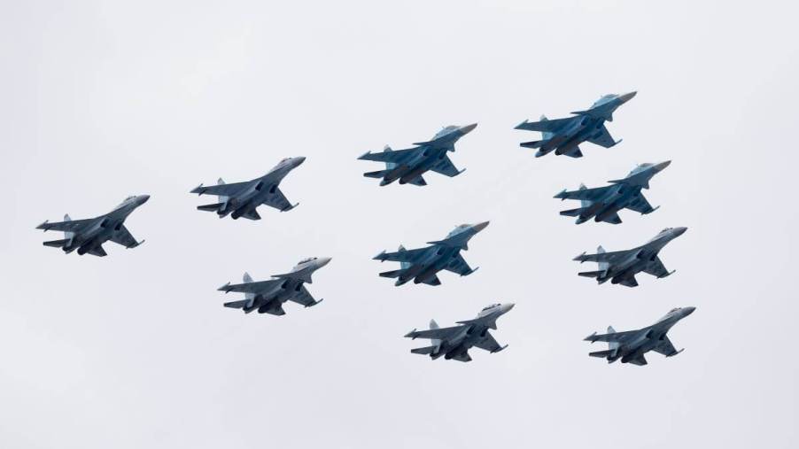 A collection of Sukhoi Su-34, Su-30SM, and Su-35S aircrafts performing in the 76th Victory Day parade