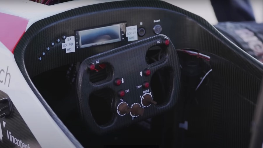 The carbon fiber steering wheel and cockpit of the 0-60 record breaking Mythen student formula car.