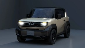 VinFast VF3 mini EV SUV studio shot with lights on