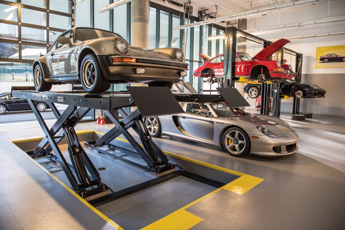 Cars being worked on at the Porsche restoration facotry.