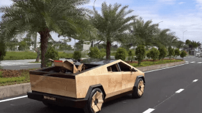 Wooden Cybertruck driving on the highway