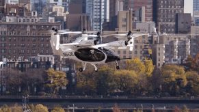Joby Aviation S5 eVTOL flying car taxi with Manhattan in background