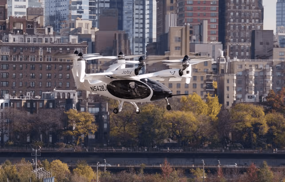 Joby Aviation S5 eVTOL flying car taxi with Manhattan in background