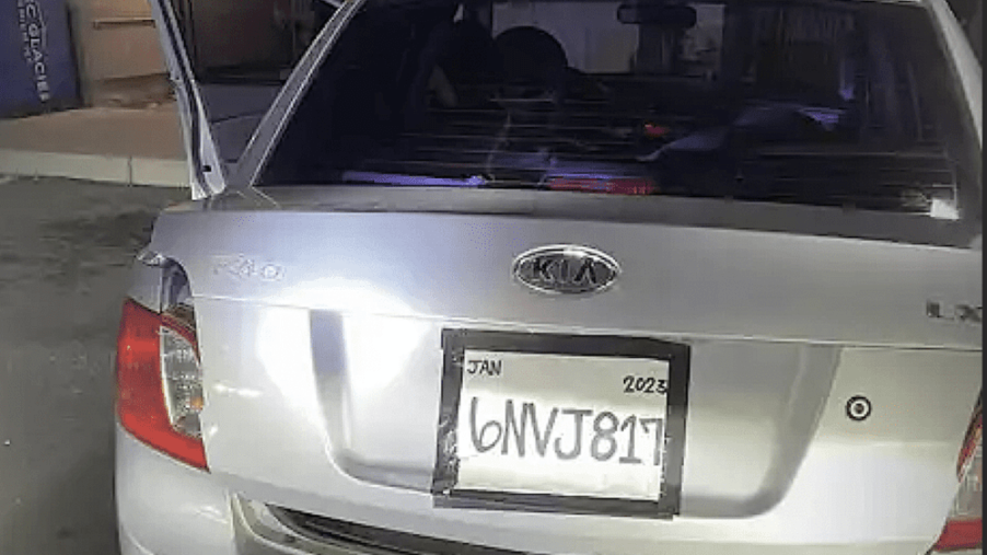 Rear shot of fake license plate on Kia Rio