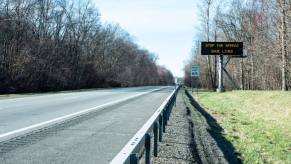 An empty interstate highway during the day.