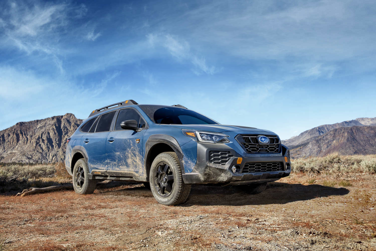 A Subaru Outback in the dirt