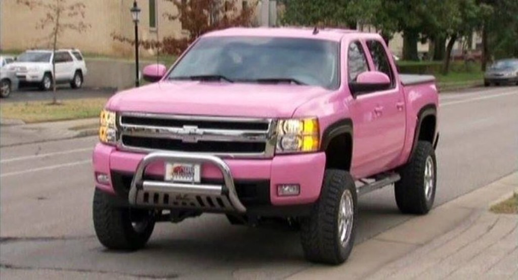 Taylor Swift has a pink Chevrolet Silverado in her car collection just like this one.