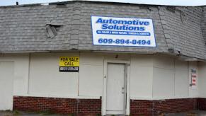 A closed down gas station and automotive repair shop for sale or rent for DIY projects in Pemberton, New Jersey
