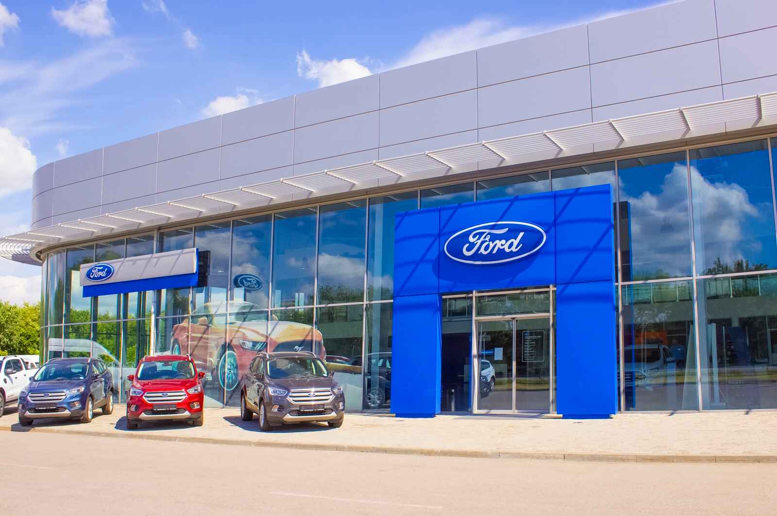 A Ford CPO certified pre owned car dealership exterior is shown