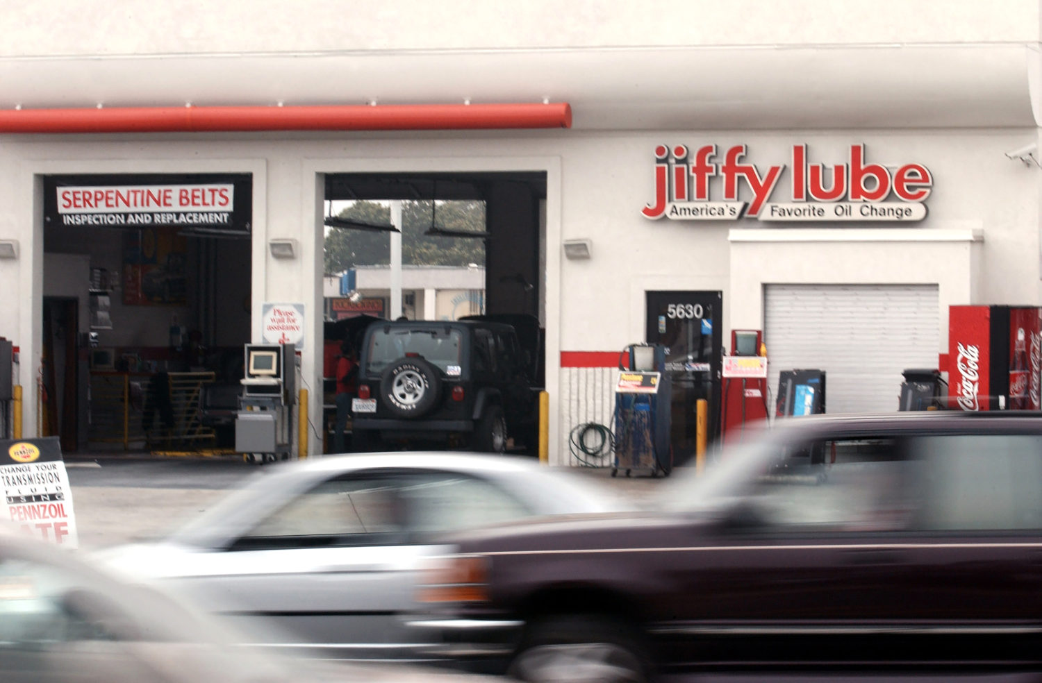 If you car is burning oil, take it to a mechanic shop like this