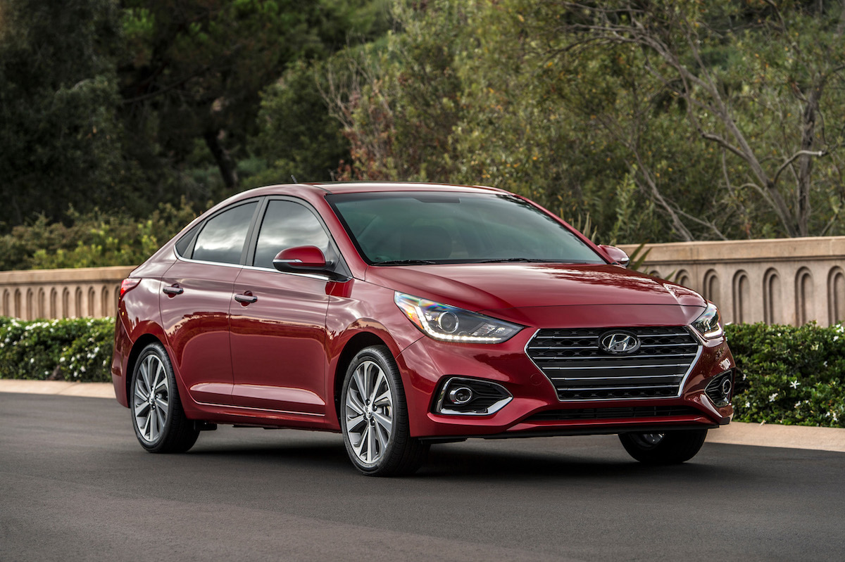 A red Hyundai Accent, which is one of the most reliable Hyundai models.