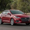 A red Hyundai Accent, which is one of the most reliable Hyundai models.