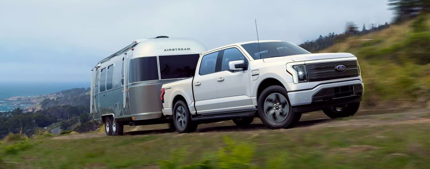 The 2023 Ford F-150 Lightning towing a trailer