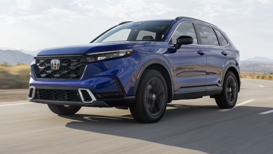 The 2023 Honda CR-V driving on the road