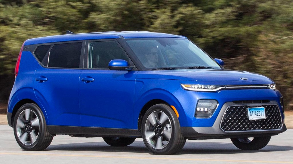 The 2023 Kia Soul driving on the street