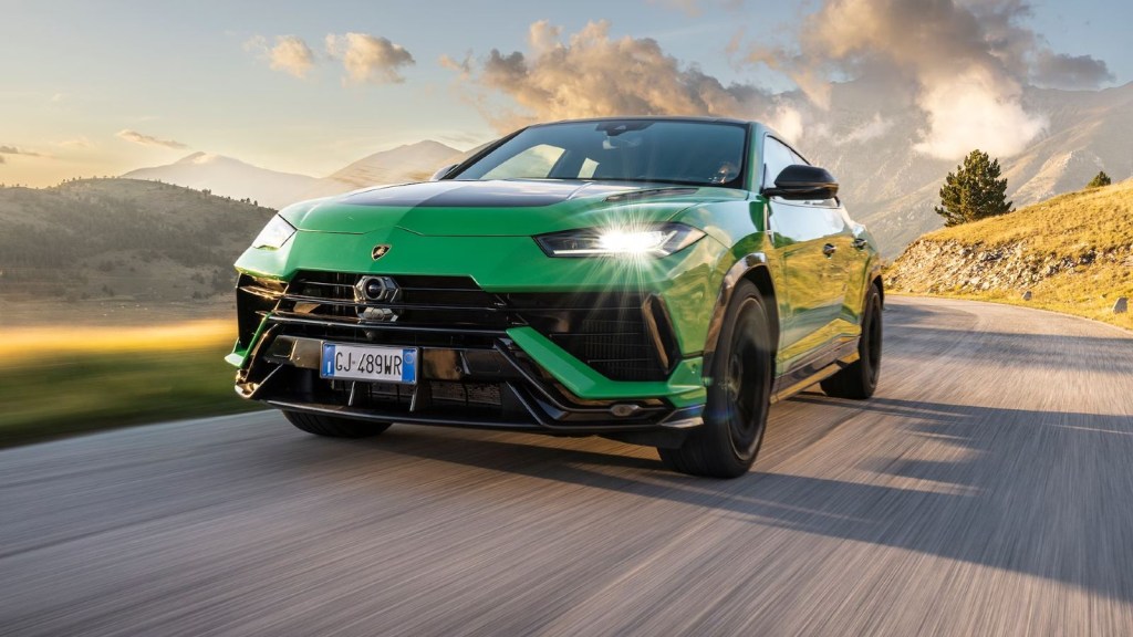 Green 2023 Lamborghini Urus Performante driving. This is the best-handling SUV tested.