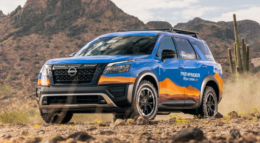 The 2024 Nissan Pathfinder Rock Creek Edition off-roading in sand