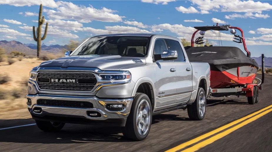 The 2023 Ram 1500 towing a boat
