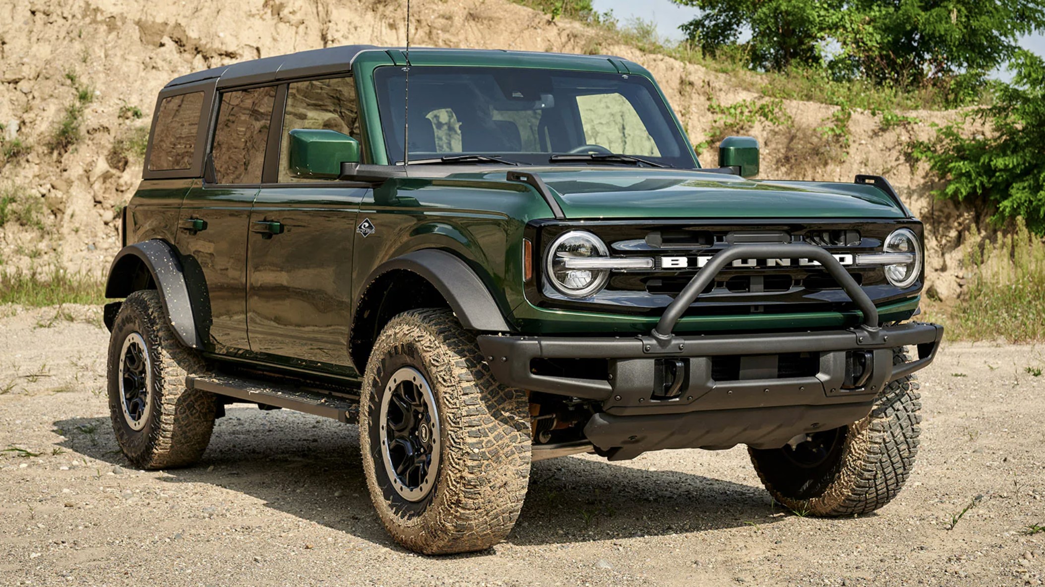 The 2024 Ford Bronco off-roading in the dirt