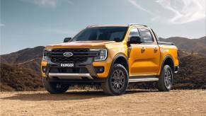 The 2024 Ford Ranger driving in dirt