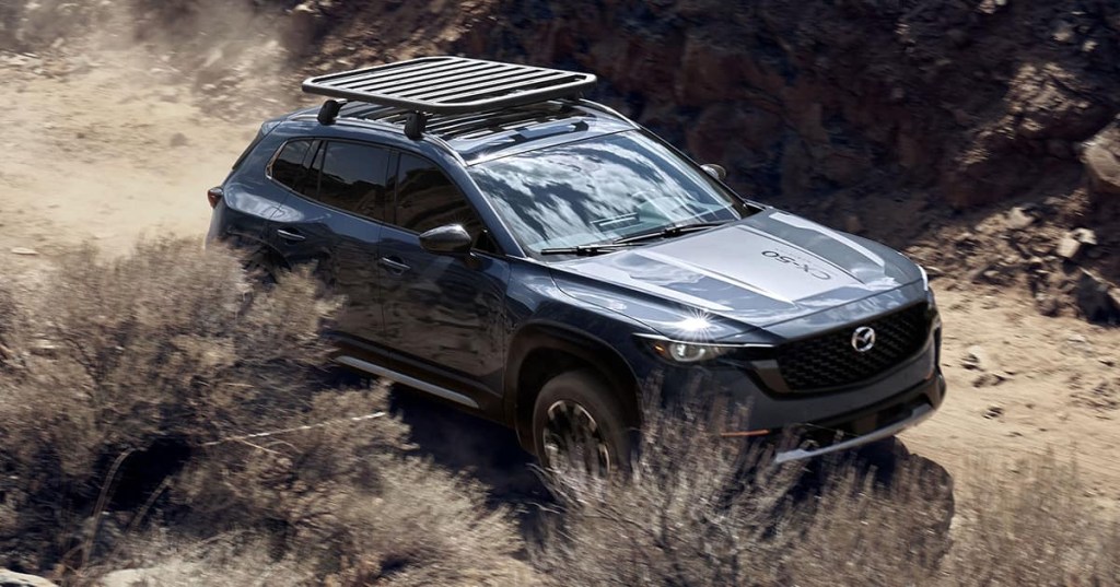 The 2024 Mazda Cx-50 off-roading on a dirt path