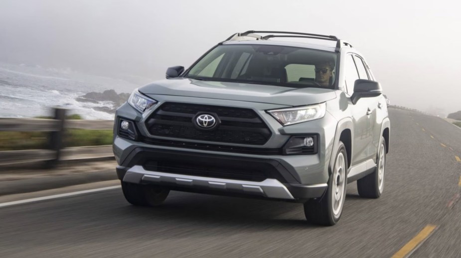 The 2024 Toyota RAV4 driving on the road