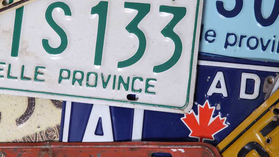 License plates from multiple provinces in Canada.