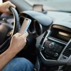 Distracted Driver Using Their Phone, this driver should make a New Year's Resolution to be drive better