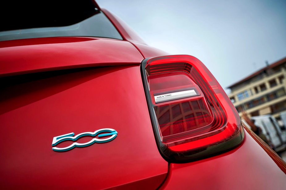 A 2024 FIAT 500e shows off its rear lights and badge.
