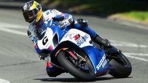 Guy Martin takes a corner on his motorcycle before the Isle of Man TT.