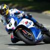 Guy Martin takes a corner on his motorcycle before the Isle of Man TT.