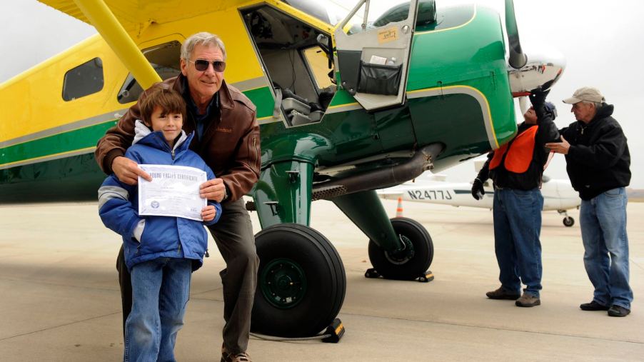 Harrison Ford gives children airplane rides in Denver, Colorado.
