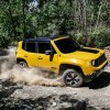 The Jeep Renegade Trailhawk off-roading in the woods