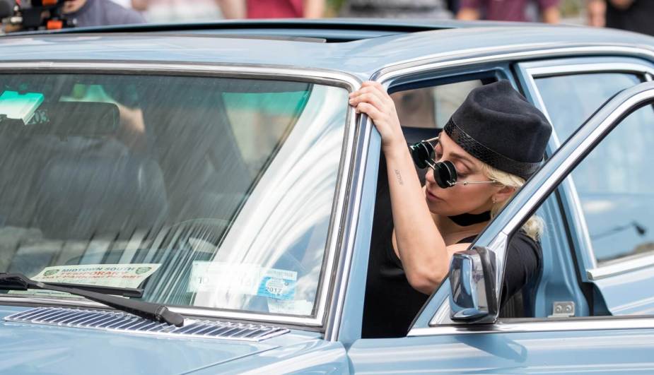 Lady Gaga gets into her W123 Mercedes.