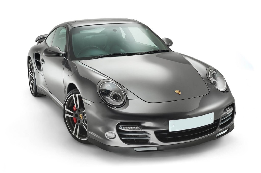 A Porsche 911 Turbo 997, a spectacularly balanced German car, shows off its front end. 