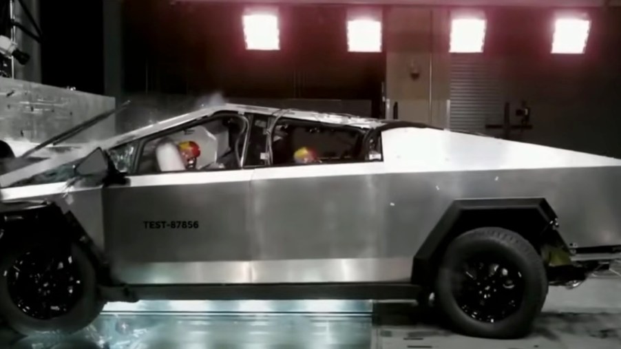Side view of a Tesla Cybertruck during a crash test.