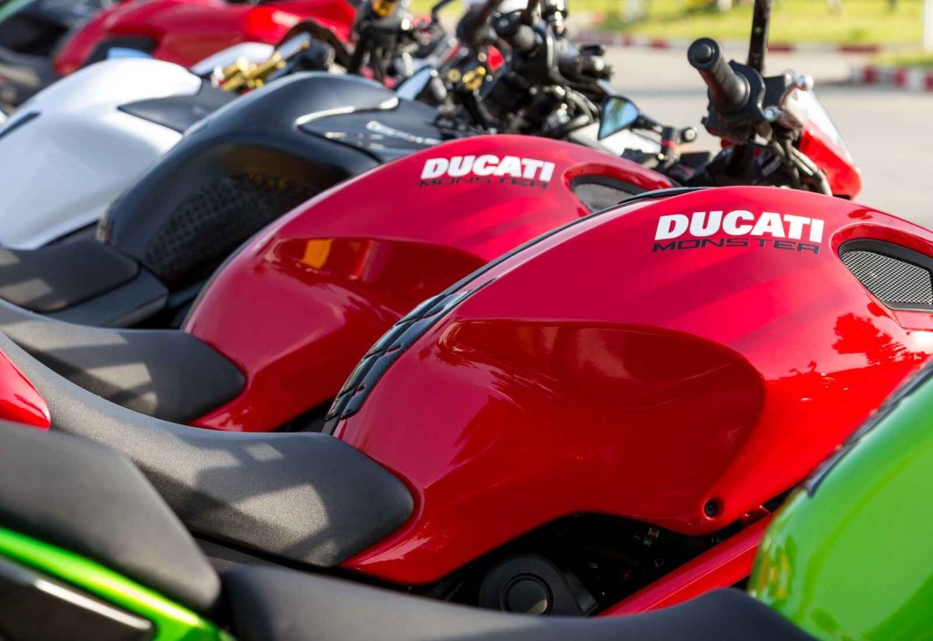 A row of Ducati motorcycles shown parked in close view
