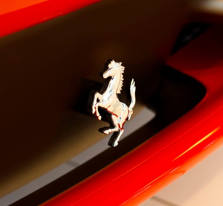 A badge on a Ferrari 458 like the one in Taylor Swift's collection shines.