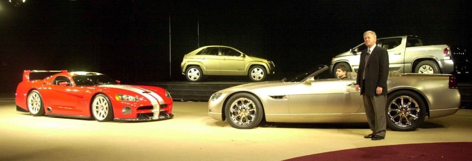 The DaimlerChrysler concept line unveiling, including a green Jeep Varsity, at the 2000 Detroit Auto Show.
